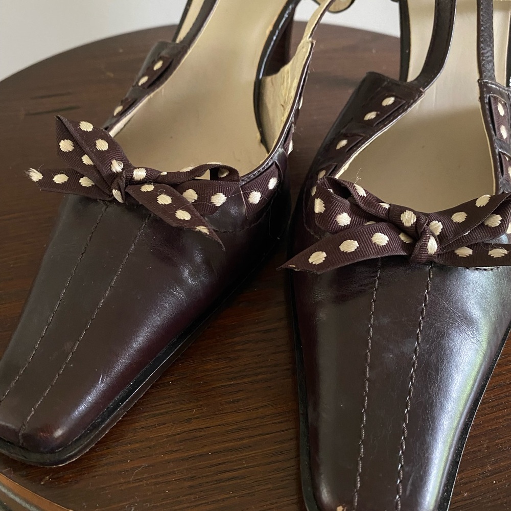 Classic Brown and White Leather Heels with Moccasin Toe